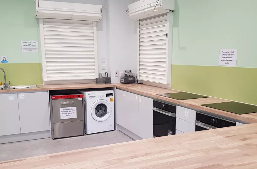 View of hob and washing machine