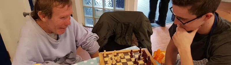Two Kilburn Good Neighbours playing chess