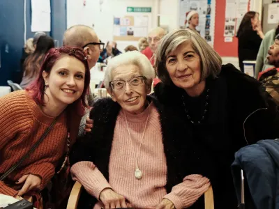 Three women of different ages at the Abbey Christmas party